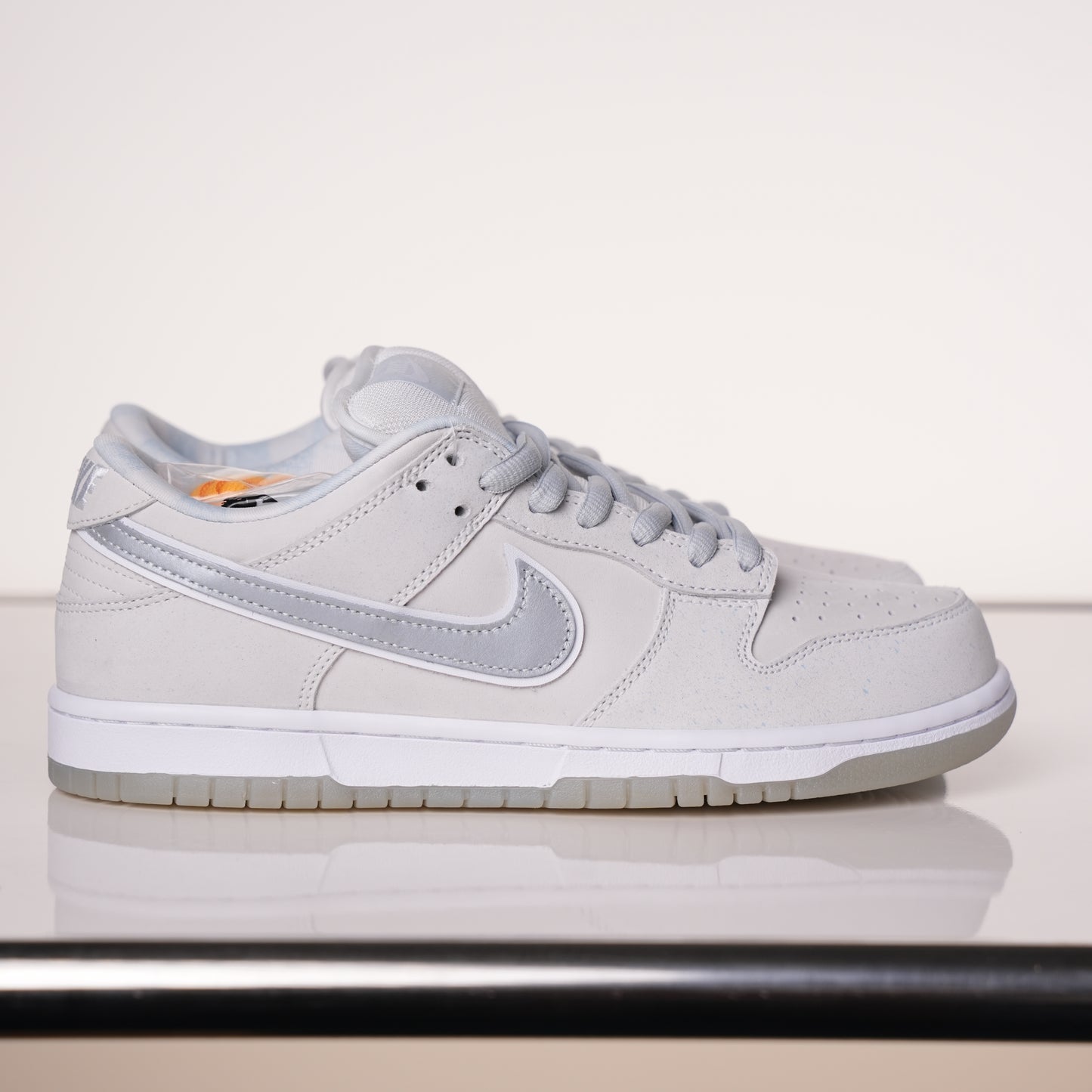 CONCEPTS × Nike Dunk SB Low White Lobster