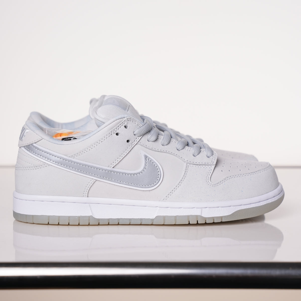 CONCEPTS × Nike Dunk SB Low White Lobster