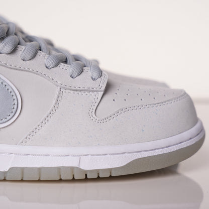 CONCEPTS × Nike Dunk SB Low White Lobster