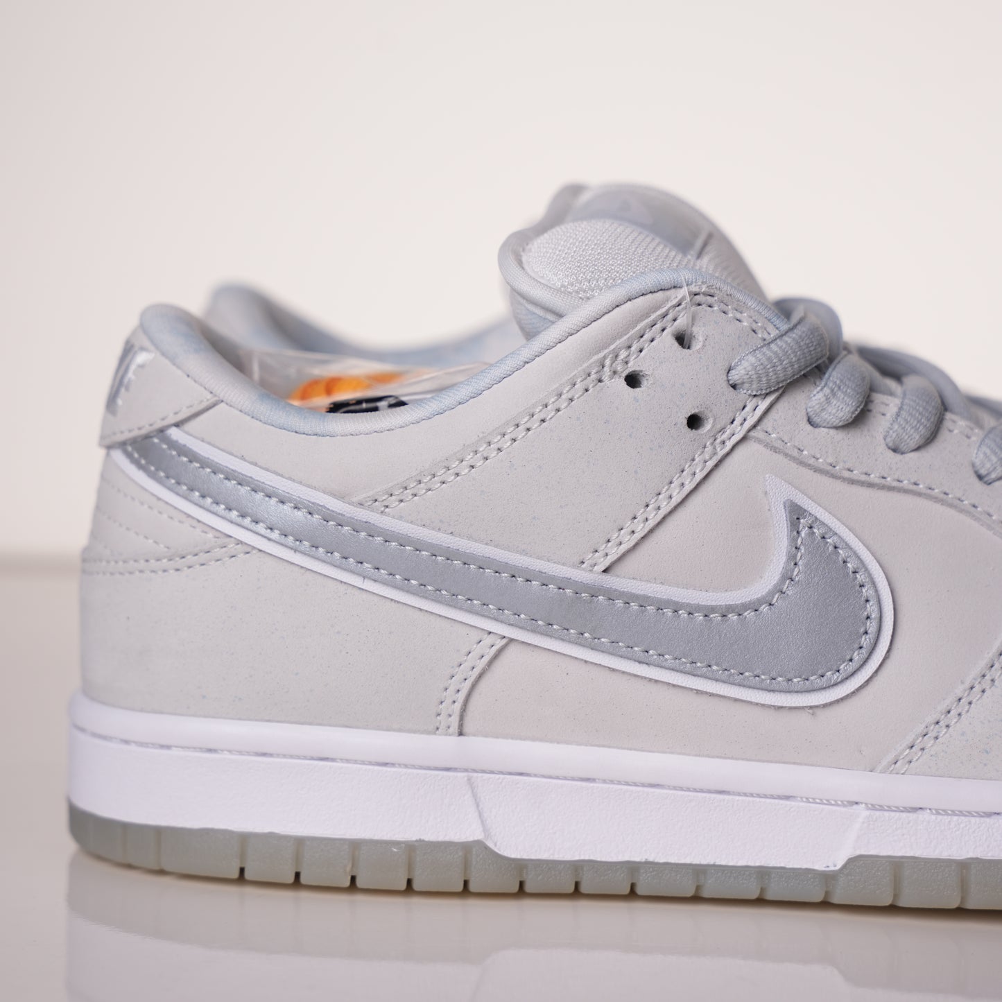 CONCEPTS × Nike Dunk SB Low White Lobster