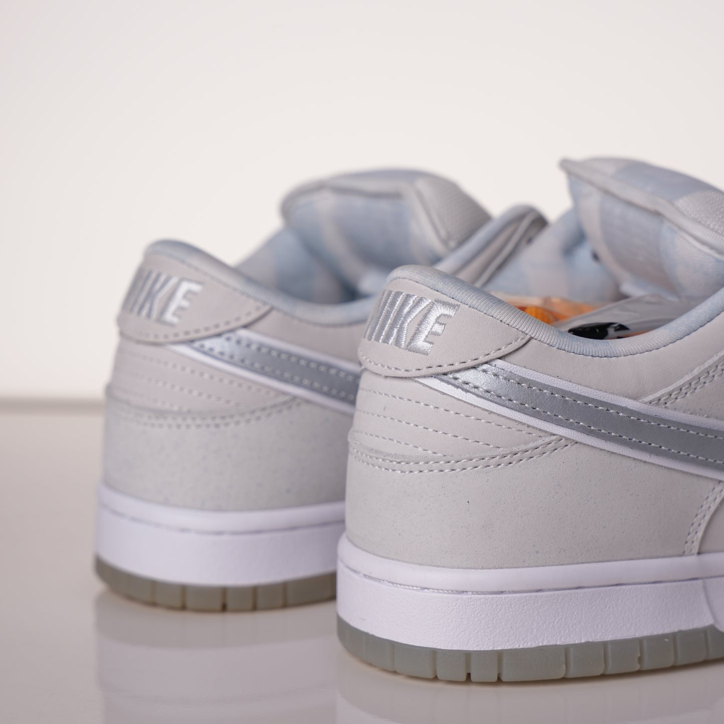 CONCEPTS × Nike Dunk SB Low White Lobster