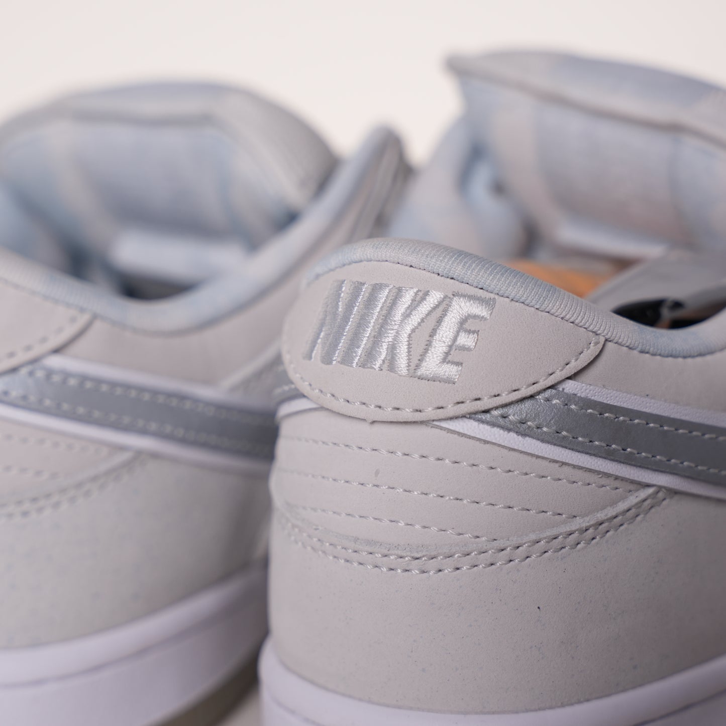 CONCEPTS × Nike Dunk SB Low White Lobster