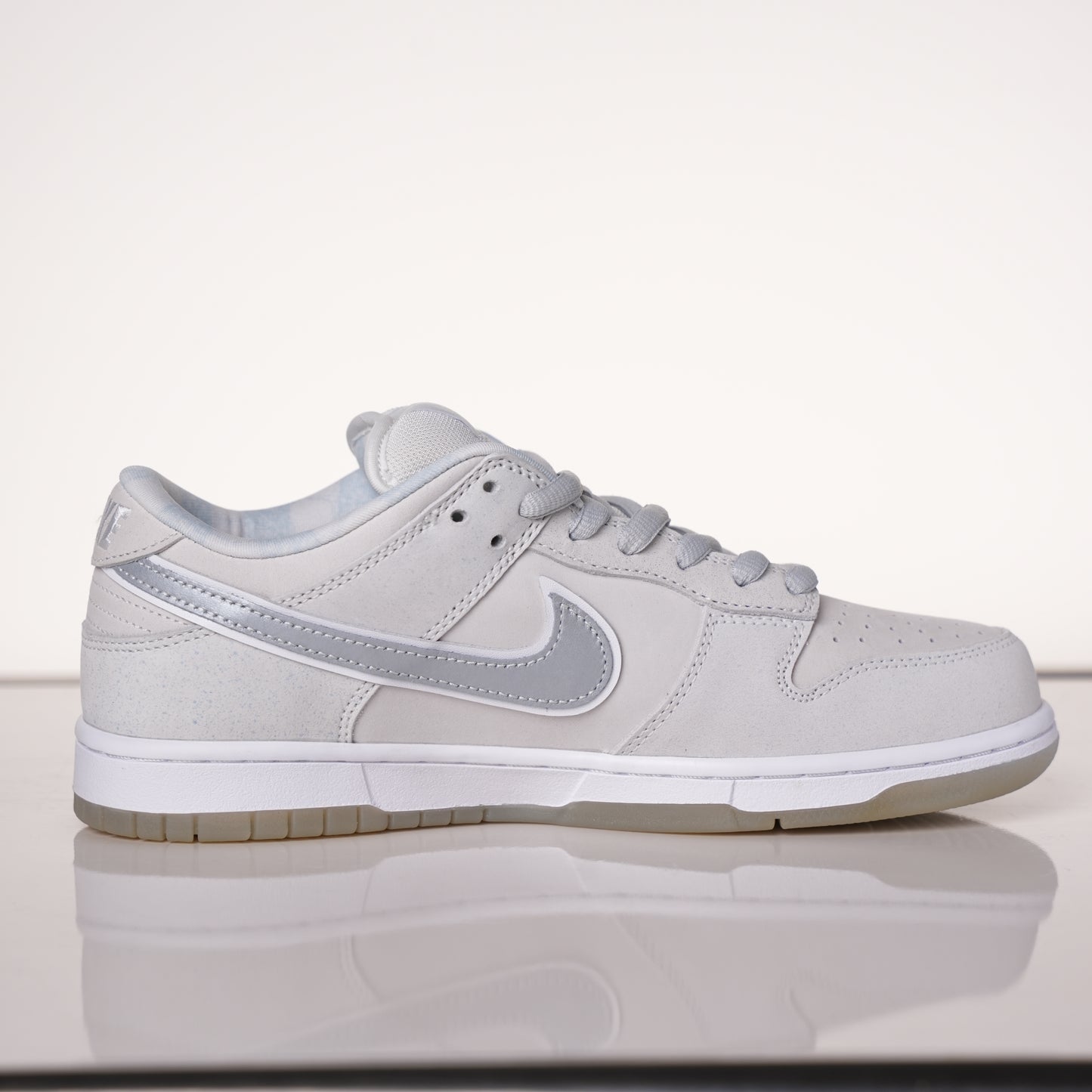 CONCEPTS × Nike Dunk SB Low White Lobster