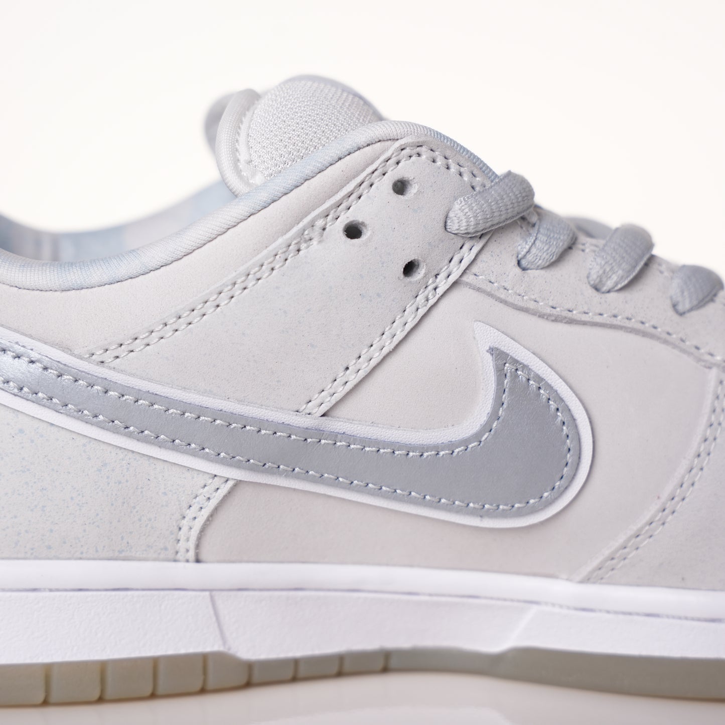 CONCEPTS × Nike Dunk SB Low White Lobster