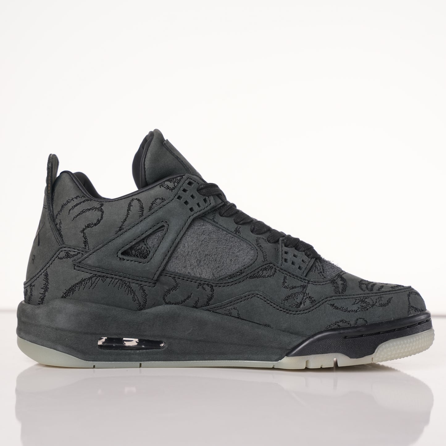 Air Jordan 4 Retro Kaws Black